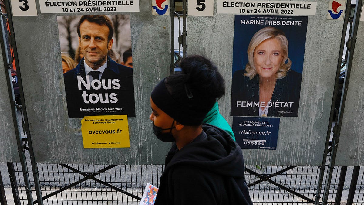 Macron holds on amid polarisation in French elections