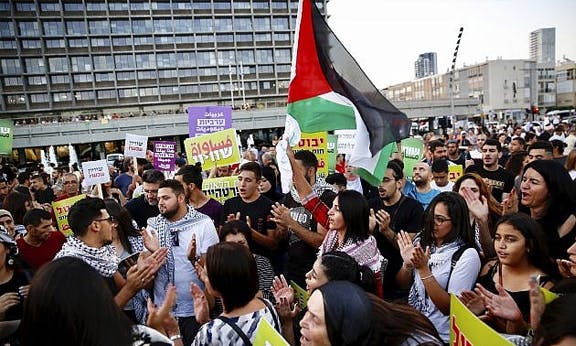 Palestinians strike against racist law