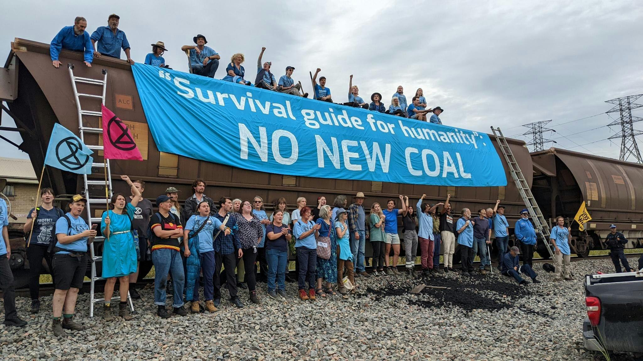 Mass arrests as climate protesters halt coal train